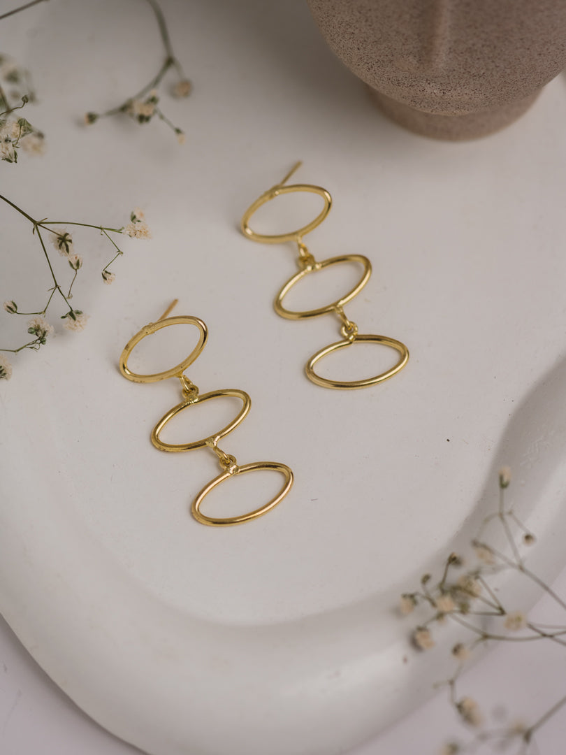 Orbit Brass Statement Earring